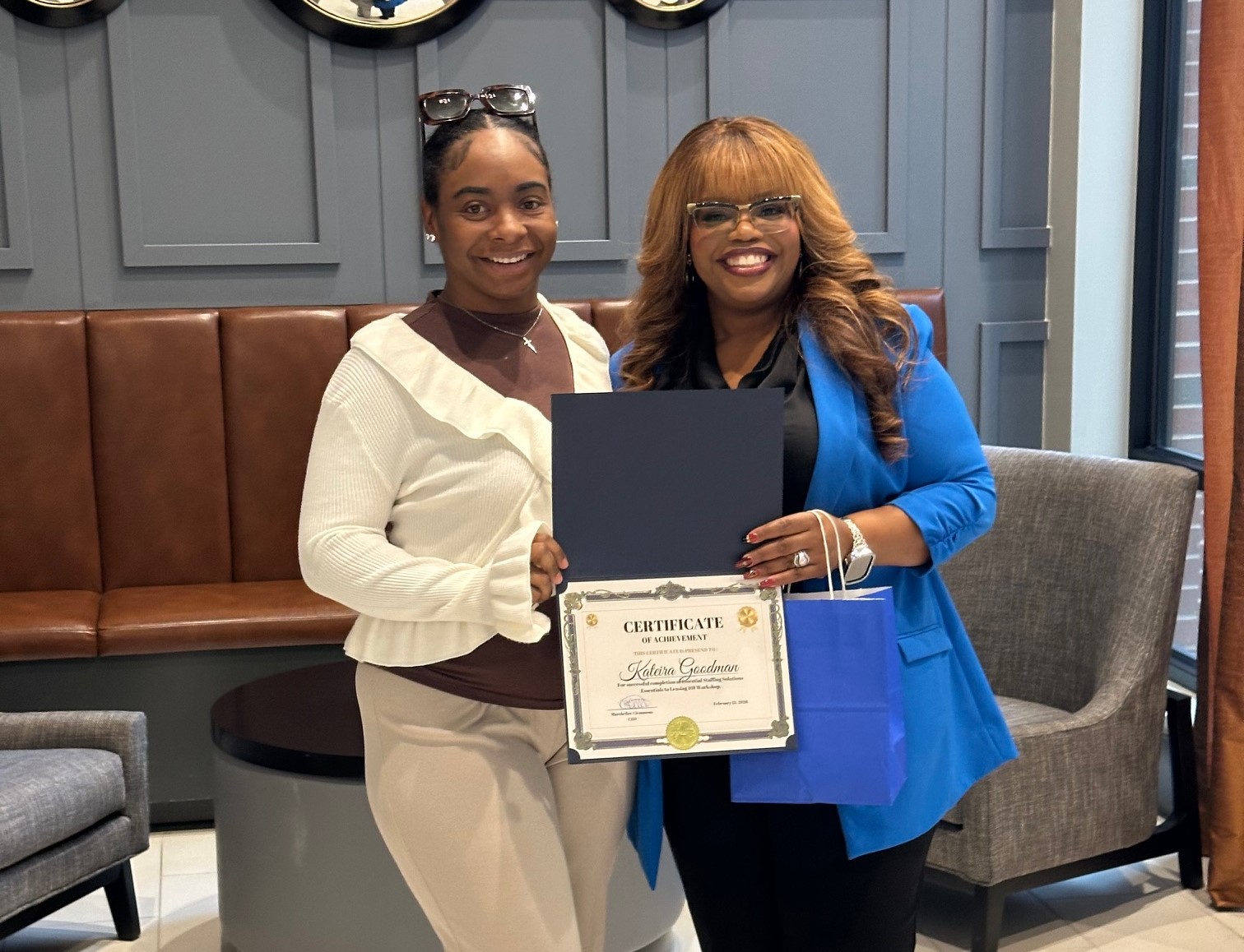 Entryway participant holding career and leasing training certificate from Essentials Staffing